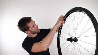 FLO Cycling  How to Install a Clincher Tire [upl. by Duomham]