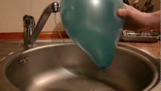 Electric force between the water and the balloon  physics experiment [upl. by Nole11]