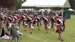 March of the Atholl Highlanders and Pipe Band during Atholl Gathering Highland Games in Scotland [upl. by Lartnom]