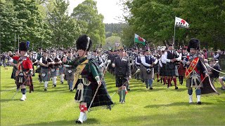 Massed Pipes and Drums morning parade during the 2022 Gordon Castle Highland Games in Scotland [upl. by Wiltz]