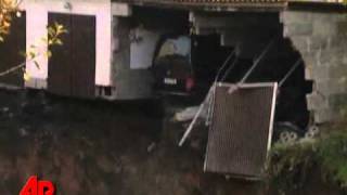 Raw Video Giant German Sinkhole Swallows Garage [upl. by Daphne76]