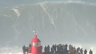 Big wave surfers ride 20 metre waves in Nazare [upl. by Jesse129]