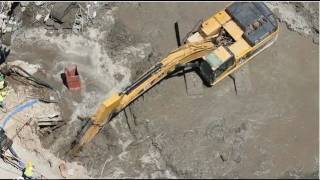 Cat 345DL Excavator digging in extreme mud [upl. by Ignacia]