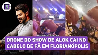 Drone em show de Alok cai na cabeça de mulher e fica preso no cabelo veja vídeo [upl. by Bal553]