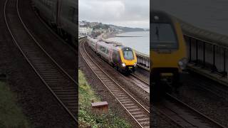 Cross country class 220 clattering along the seawall at DawlishBristol to Plymouth service 220021 [upl. by Luhem]