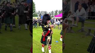 80 Year old drummajor leads pipesanddrums march during 2024 Oldmeldrum highlandgames shorts [upl. by Samal]