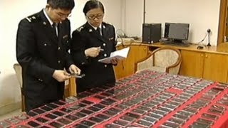 iPhone Smuggling in China [upl. by Ahtelra]