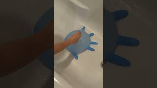 Giant rubber glove with water in popped slow motion [upl. by Sheridan]