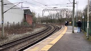 Britannia and Sir Nigel Gresley double heading a passenger train at Earlestown station [upl. by Atteuqram]