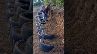 Slope protection building process with tires [upl. by At]