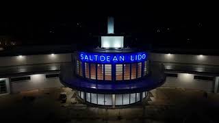 Saltdean Lidos iconic neon sign has been turned on for the first time since World War II [upl. by Adiuqal]