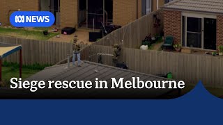 Family rescued after tense standoff with armed gunman in their Melbourne home  ABC News [upl. by Charlot]