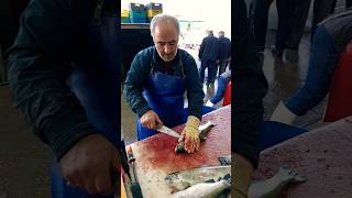 Cleaning farmed trout at a fishmongers with great skill [upl. by Netsirk]