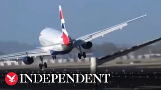 Storm Eunice BA jet almost flips over during Heathrow landing [upl. by Adnir760]