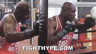 EVANDER HOLYFIELD THUMPING ON HEAVY BAG amp MITTS TRAINING AT AGE 57 FOR EXHIBITION COMEBACK [upl. by Kay]