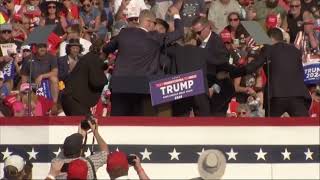 Donald Trump rushed off stage at Pennsylvania rally after apparent gunshots rang through the crowd [upl. by Silsbye]