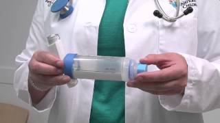 Asthma howto How to use an inhaler with a spacer and mouthpiece [upl. by Frodin669]