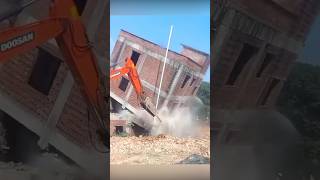 Excavators demolish buildings with ease [upl. by Lenz128]