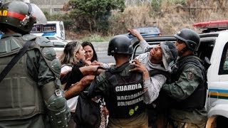 Joven detenido es herido a quemarropa por la GNB [upl. by Nirej]