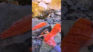 Cooking A Whole Salmon 🐟  SALMON cooked and smoked over fire 🔥 shorts asmr cooking fish [upl. by Anallise629]