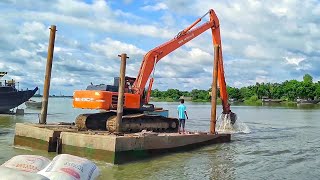 Excavator on pontoon in River TATA HITACHI EX 215 Super long reach [upl. by Idner56]