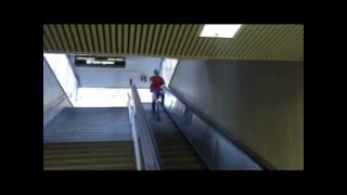 Insane Unicycle Escalator Downhill Ride 3 Juggling Clubs [upl. by Rovert]