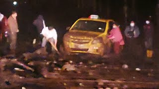 Ecuador Flash Floods Car Stuck in Mud During Heavy Rain  WooGlobe [upl. by Ifill]