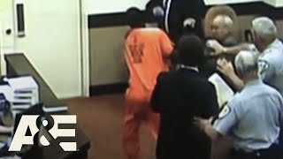 Court Cam Defendant PUNCHES StandIn Lawyer After Sentencing  AampE [upl. by Ettevol]