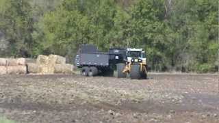 Terragator pulling Artex CB900 Manure Spreader [upl. by Hally]