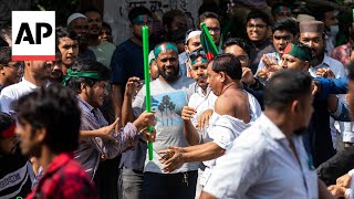 Bangladesh protesters attack supporters of Sheikh Hasina and harass journalists [upl. by Nata491]