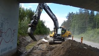 Volvo EC250DL at a roadwork with oilquick rotortilt [upl. by Hasen]