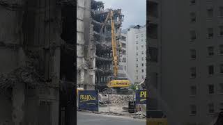 Massive demolition of tall buildings using large cranes [upl. by Einahteb260]