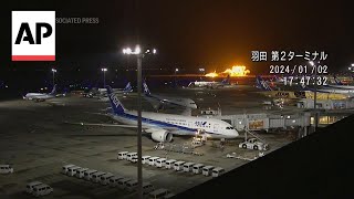 Video shows moment Japan plane crashes in Tokyo airport [upl. by Naeroled]