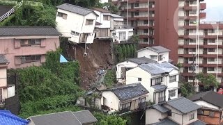 House crashes down hill after Japanese mudslide [upl. by Elnar572]