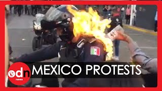 Graphic Mexican Police Officer Set on Fire During Protest Against Police Brutality [upl. by Parfitt]