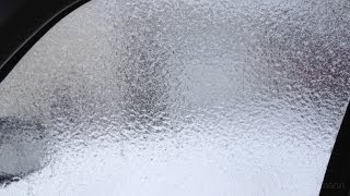 The best way to remove ice from a car window [upl. by Atikihs]