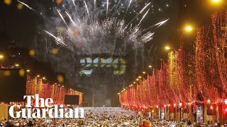 Arc de Triomphe lights up for new year in Paris [upl. by Jerrie866]