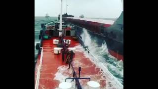 Bunkering at sea can be dangerous especially in rough weather conditions [upl. by Shaffert]