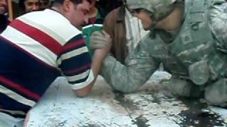 Army soldier embarrasses Iraqi in armwrestling [upl. by Ahsaten]