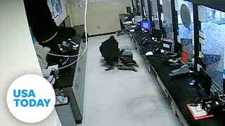 Thieves crash through ceiling during robbery  USA TODAY [upl. by Thea441]