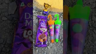 Swiss trupello chocolate amp dairy milk lolipop amp gems shorts dairymilk lollipop [upl. by Dahsar]