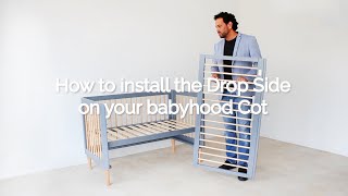 How To Install A babyhood Cot Drop Side Retractable Pin Models [upl. by Nyrhtakyram]