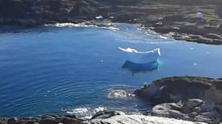 Iceberg flips over in Greenland [upl. by Ennayelsel]