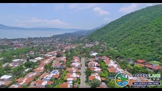 Aerial Downtown Ajijic Mexico Church Plaza Mountains amp Lake [upl. by Hamitaf]