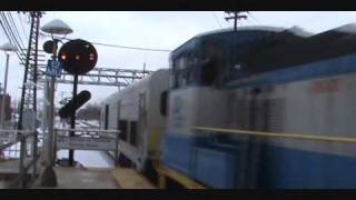 LIRR MP15AC Tows DE30AC 403 Through Mineola MEETS DE30AC 412 at speed [upl. by Emlynn402]