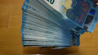 Counting stack of 20 EURO banknotes [upl. by Esekram]