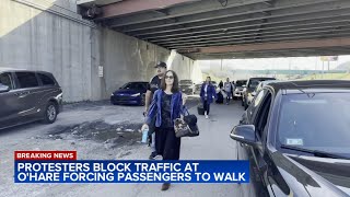 OHare Airport travelers walk to terminal as proPalestinian protesters block traffic [upl. by Eskil162]