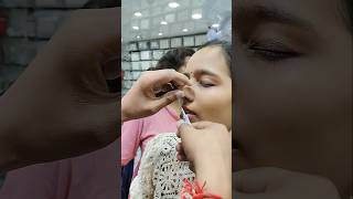 Nose piercing process with needlesilver jewellery trending youtubeshorts shorts [upl. by Ayotan567]