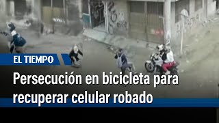 Víctima en bicicleta enfrenta y recupera celular robado en Bogotá  El Tiempo [upl. by Ayhtak]