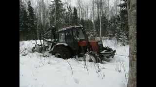 Belarus Mtz 1025 forestry tractor stuck in mud difficult conditions [upl. by Anilesor849]